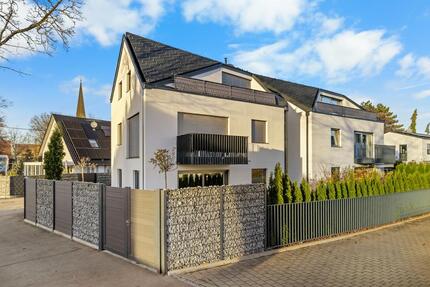 Hochwertig ausgestattete 2-ZKB-Gartenwohnung mit EBK und TG in A-Hammerschmiede zimmer